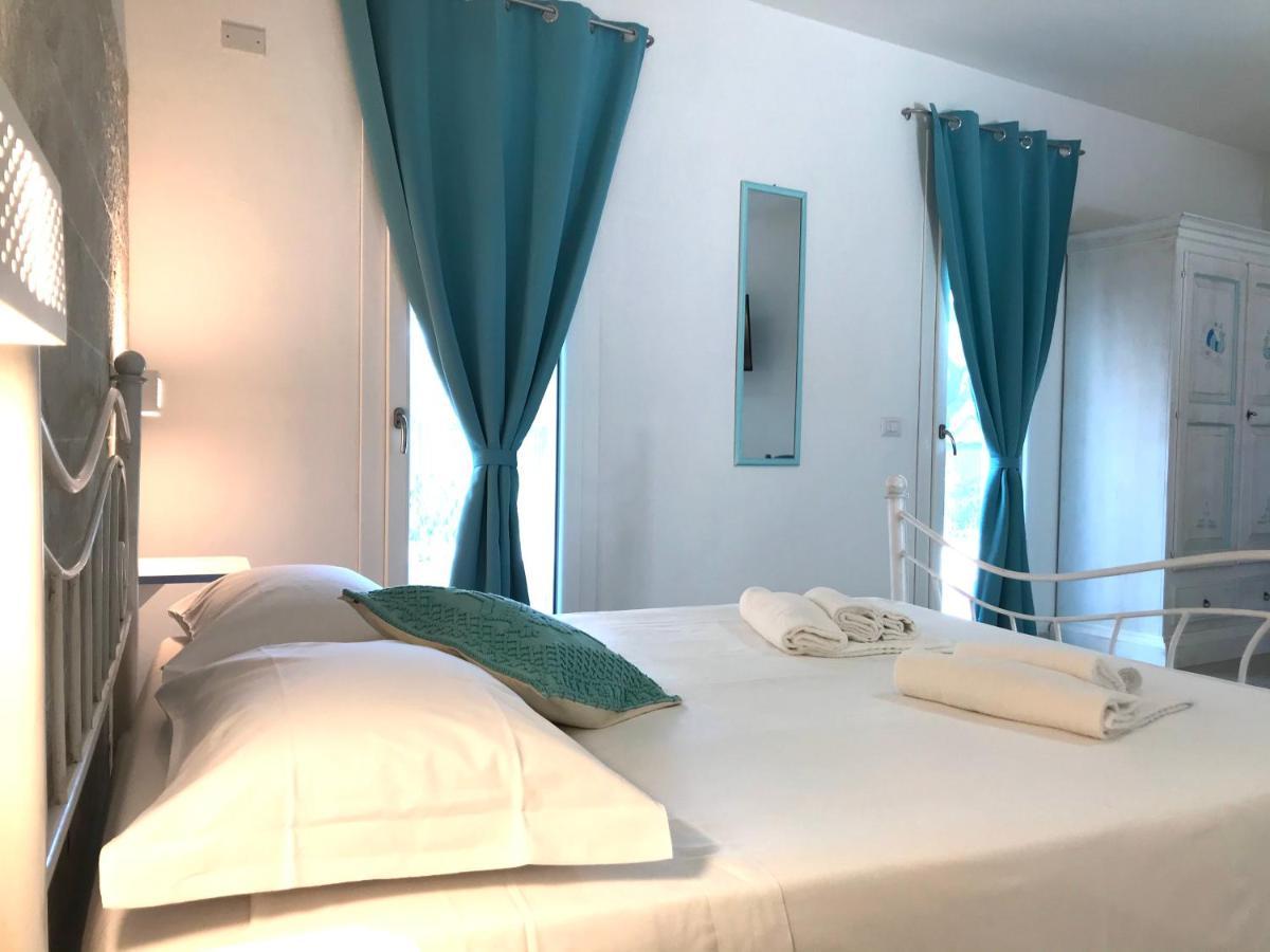 Angolo Mare Apartments & Rooms Porto Pino Exteriör bild