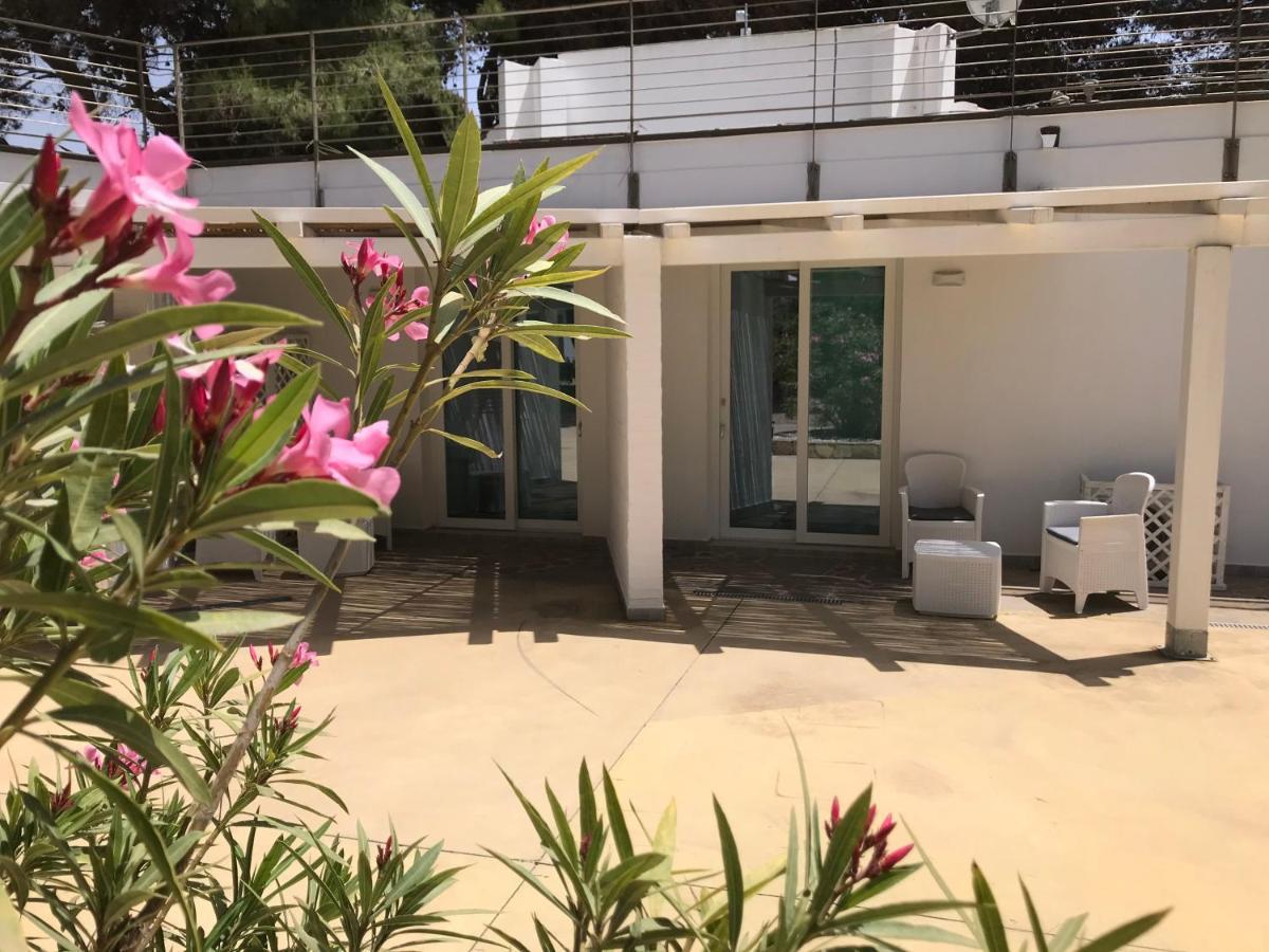 Angolo Mare Apartments & Rooms Porto Pino Exteriör bild