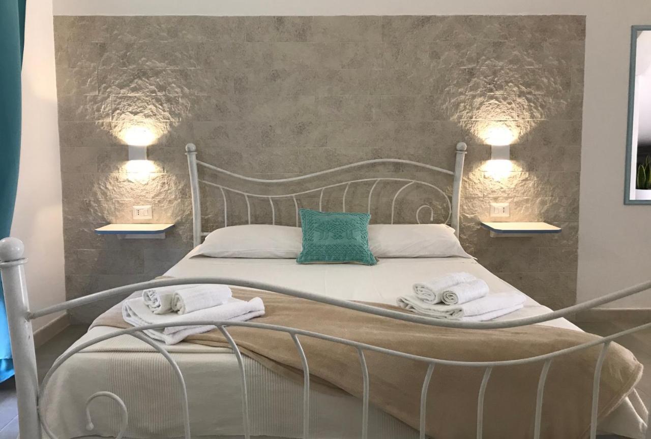 Angolo Mare Apartments & Rooms Porto Pino Exteriör bild