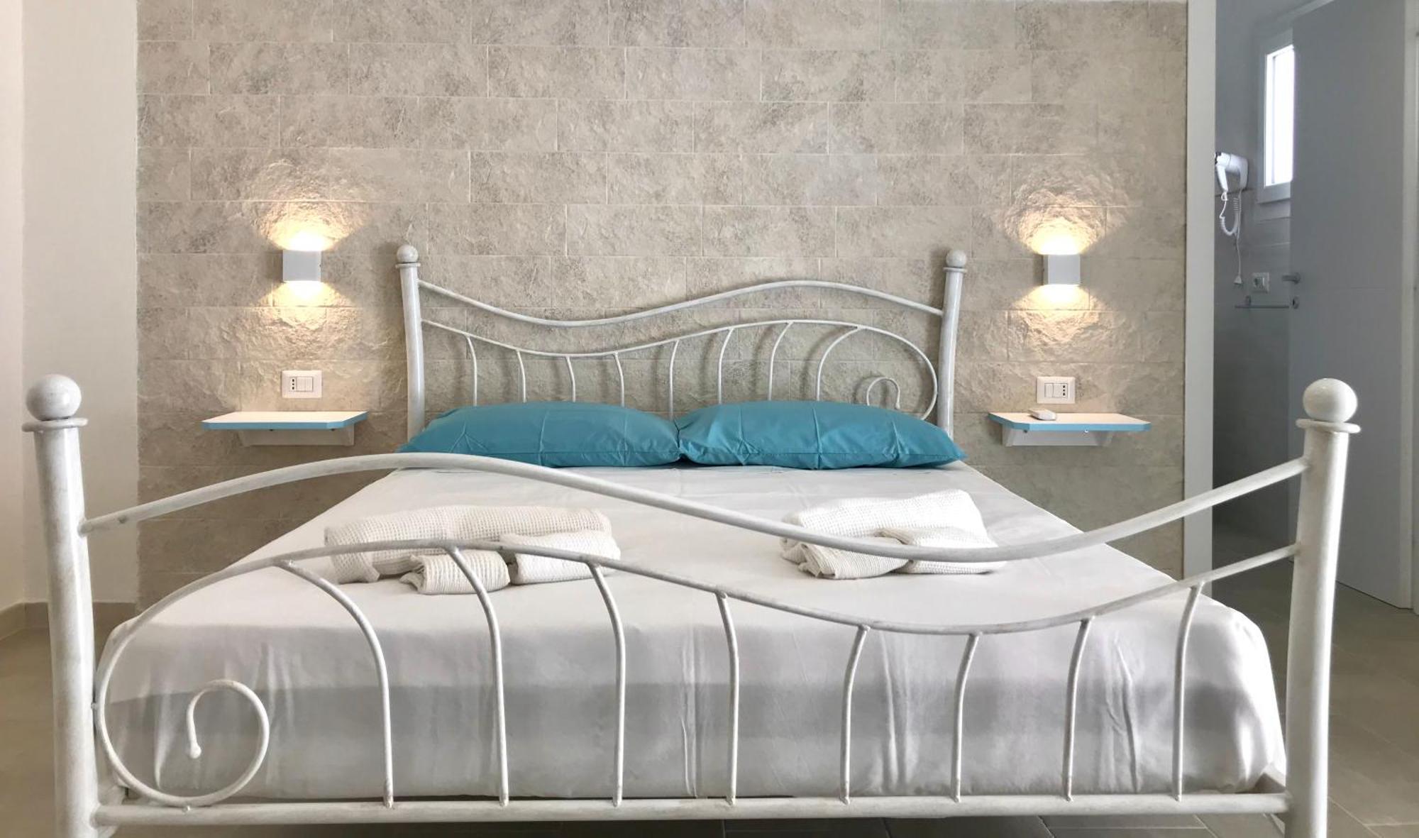 Angolo Mare Apartments & Rooms Porto Pino Exteriör bild