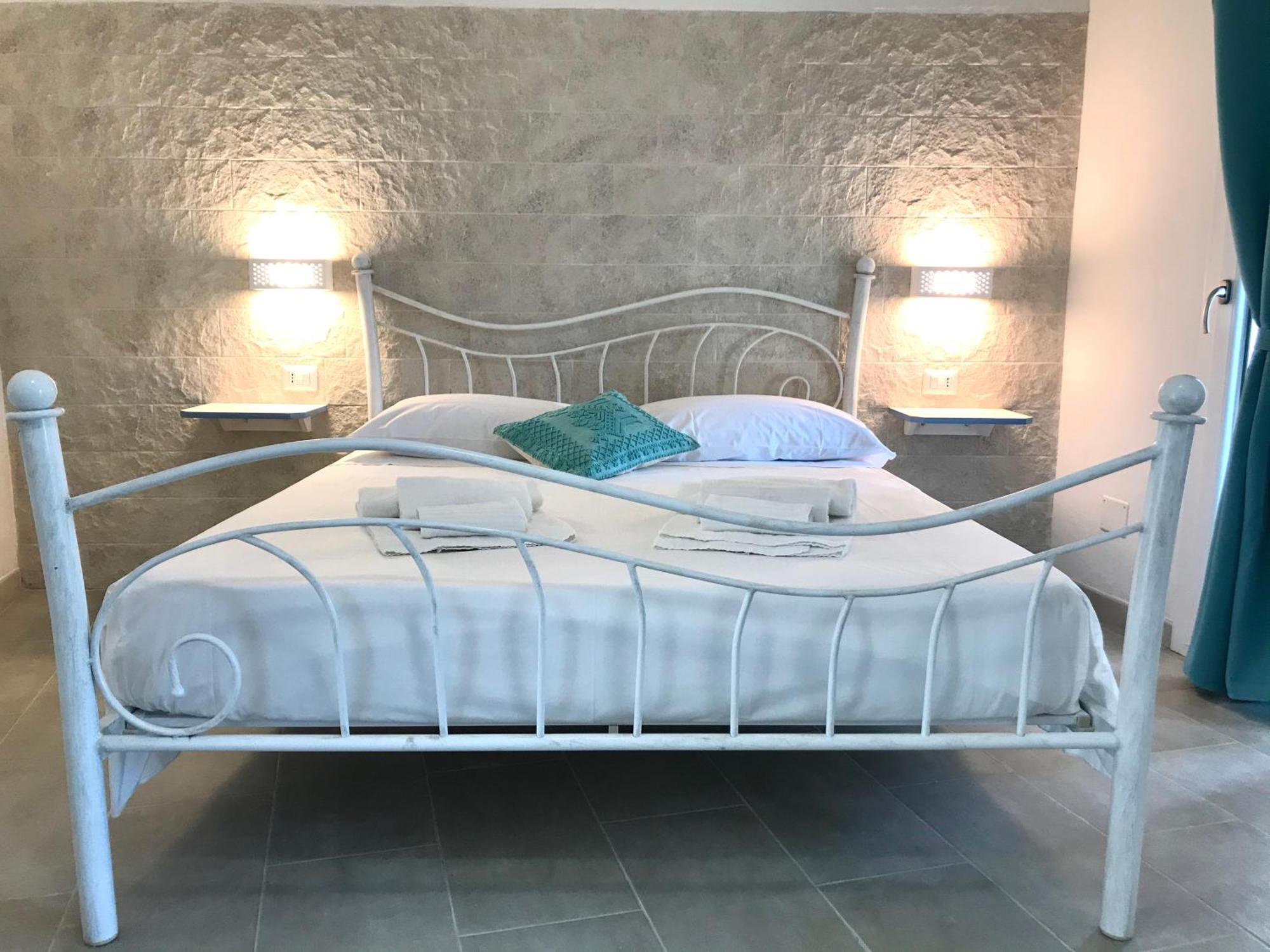 Angolo Mare Apartments & Rooms Porto Pino Exteriör bild